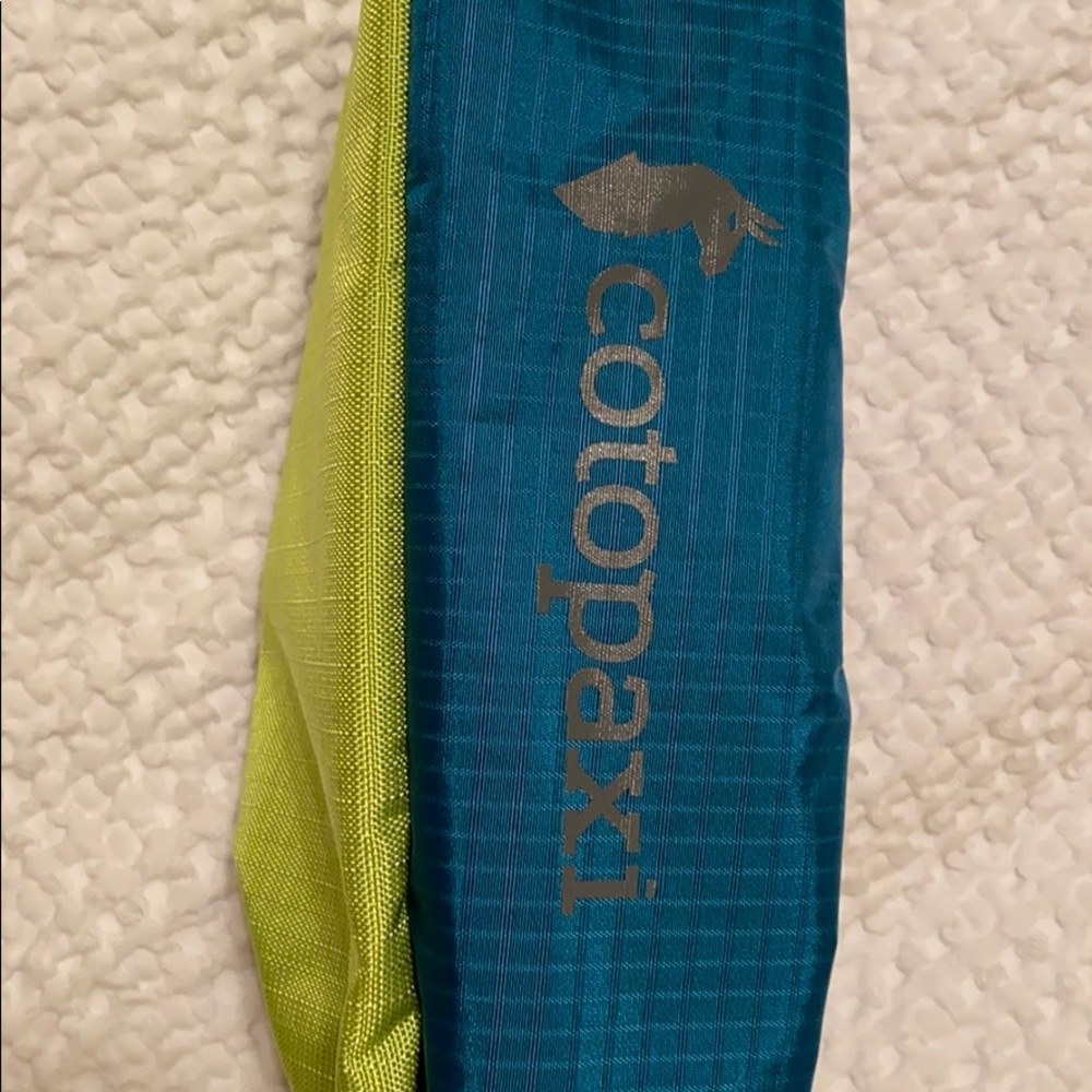Cotopaxi NWOT DOPP Del Dia